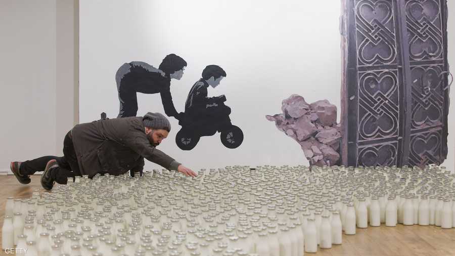 المسؤولون يقولون عن تنظيم المعرض إنه يلاقي إقبالا جماهيريا ملحوظا، وإن كثيرا من المارة في منطقة بريك لين القاطن بها المعرض يدخلون لزيارته