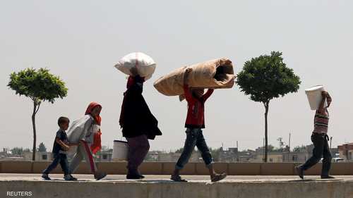 المعارك في تل أبيض أدت إلى نزوح نحو 23 ألف سوري إلى تركيا